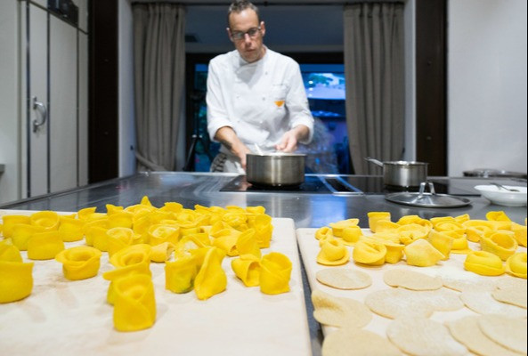 a chef preparing tortellini