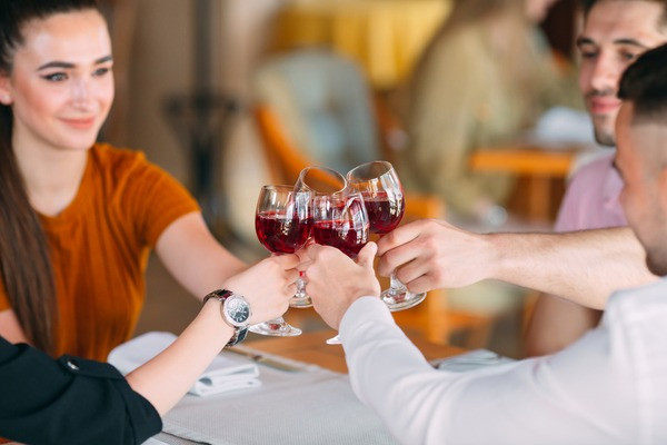 cheer with red wine and friends