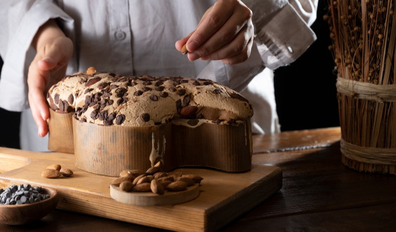 Colomba with chocolate. Easter Italian cake with almonds and chocolate in the shape of a dove