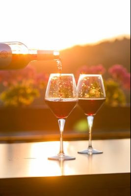 have a glass of red at sunset